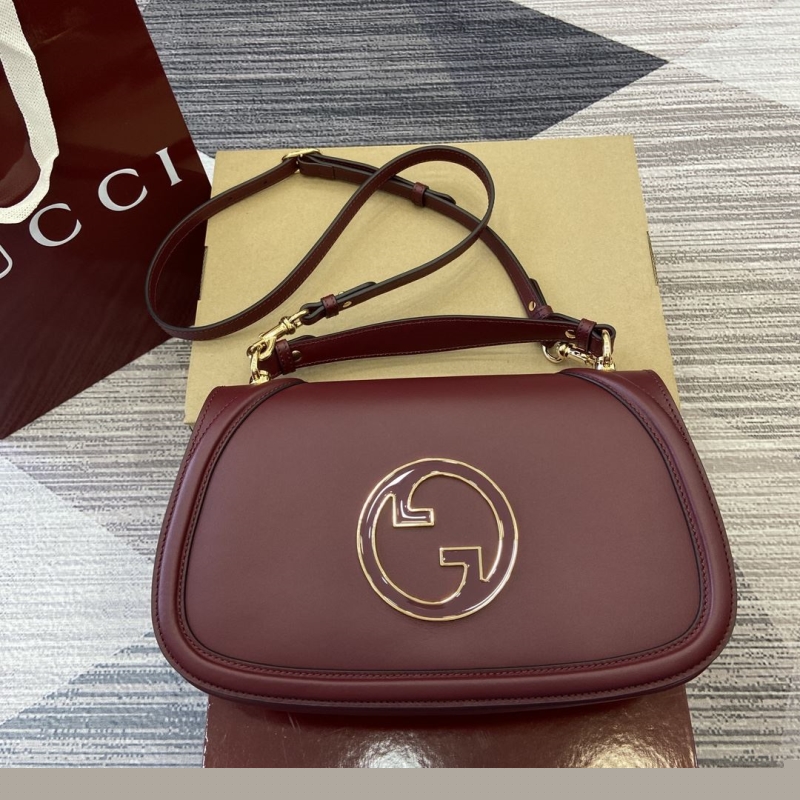 G*u*i top handle bags